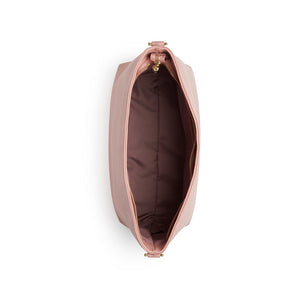 Pink handbag with gold zipper on a white background