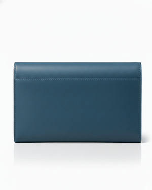 Blue clutch bag on a white background