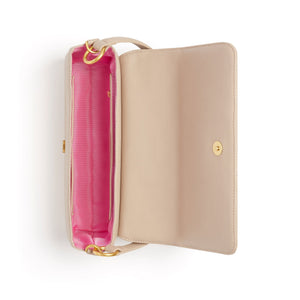 Beige handbag with pink interior on a white background