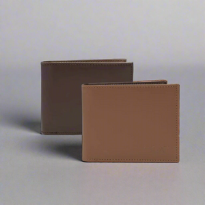Two brown leather wallets on a light gray background
