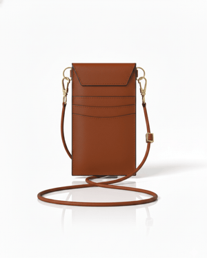Brown leather crossbody bag on a white background