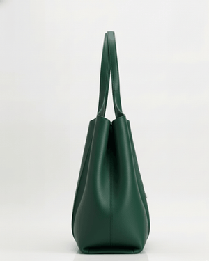 Green handbag on a white background