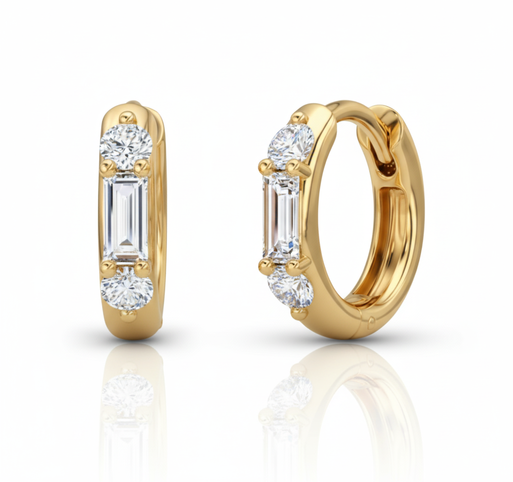 Gold hoop earrings with diamond accents on a white background