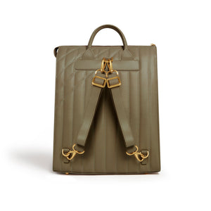 Green backpack with gold straps and hardware on a white background