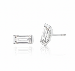 Pair of diamond stud earrings on a white background