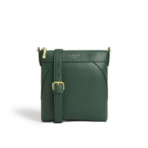 Green handbag with gold accents on a white background