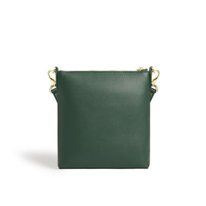 Green handbag with gold accents on a white background