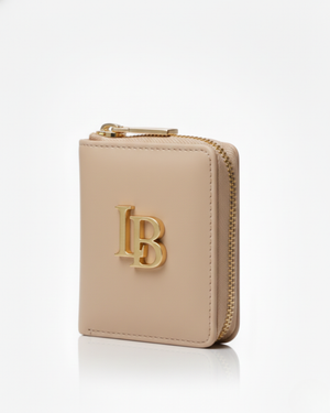 Beige wallet with gold zipper and logo on a white background