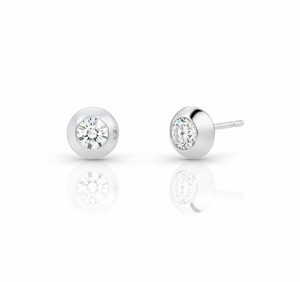 Pair of silver stud earrings with clear gemstones on a white background