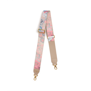 Multicolored strap with gold hardware on a white background